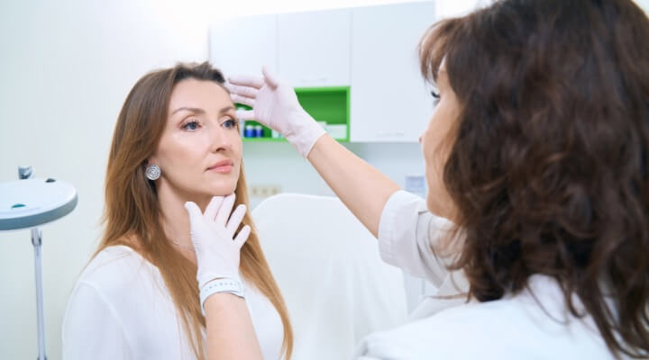 woman getting cosmetic consultation
